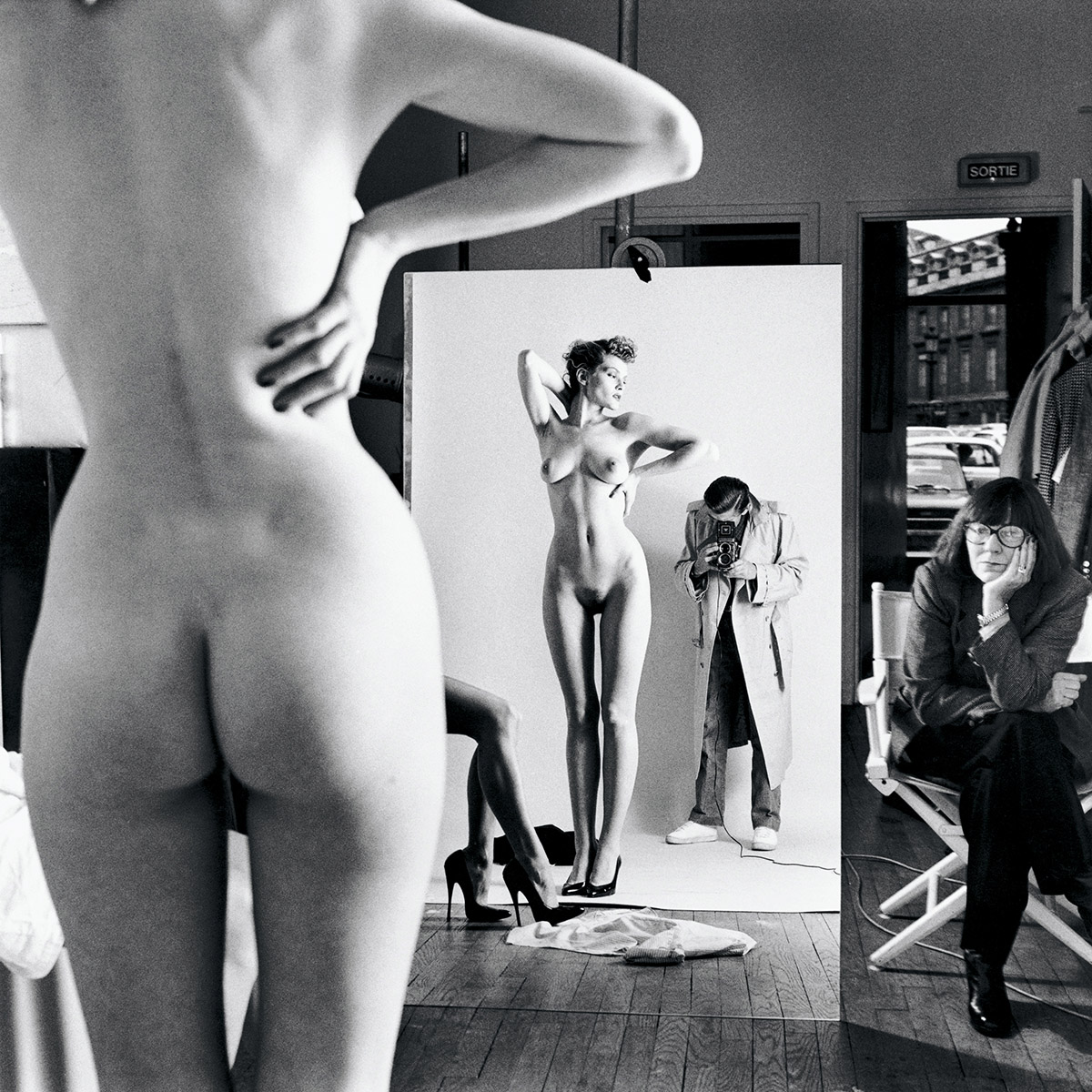 Self-Portrait with wife and models, Paris, 1981 © Helmut Newton Estate